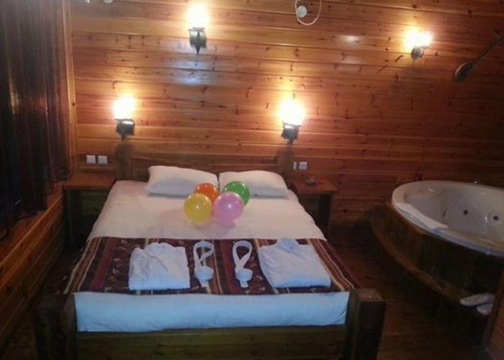 Musical Garden Cabins Ramot Quarto foto
